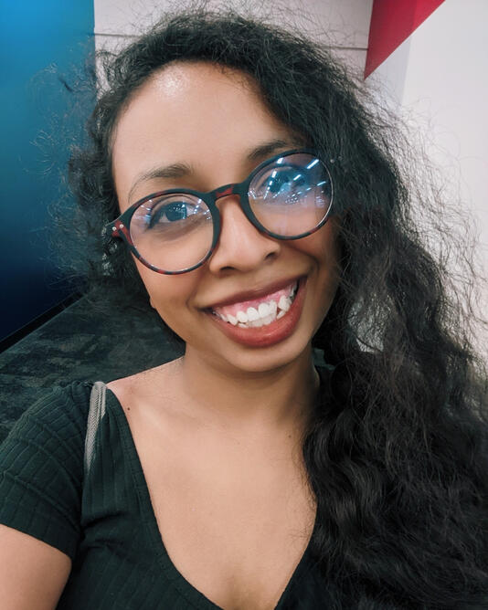 With Rounded Glasses
